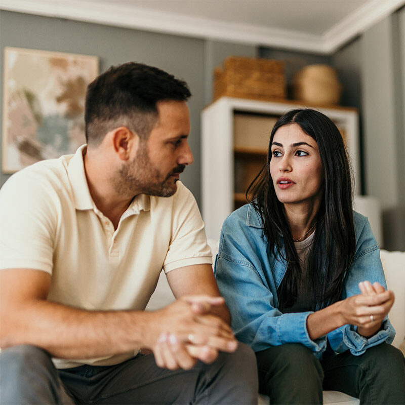 man and woman looking at each other